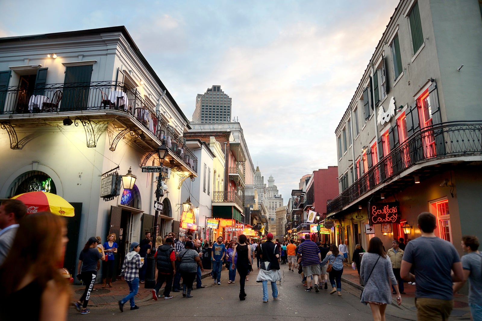 People walking through the French Quarter during Mardi Gras in New Orleans Lisa Blue